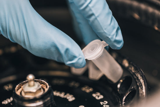 Mini Centrifuge Close-up with Gloves